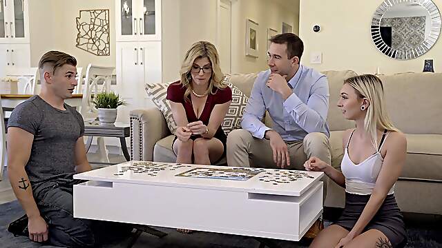 Four Sexy Babes Enjoy A Hot Foursome On The Sofa