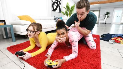 Two Playful Young Babes Getting Fucked In The Living Room