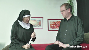 German Nun With Priest In Church